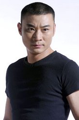 薛明