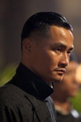 雷启英