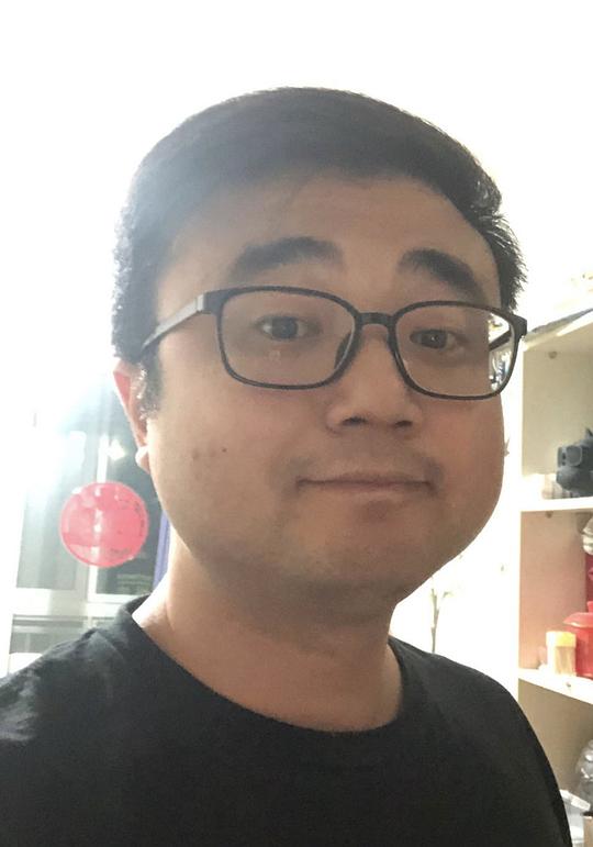 多明